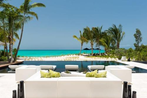 Cool beachfront fully staffed villa with unique architecture