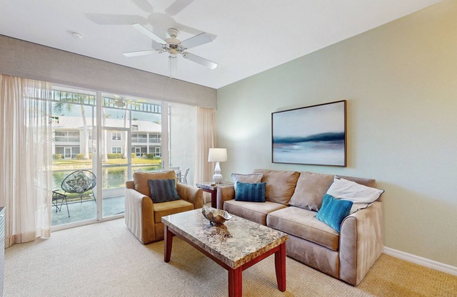 Water view condo w/access to community amenities, wifi, & outdoor private patio